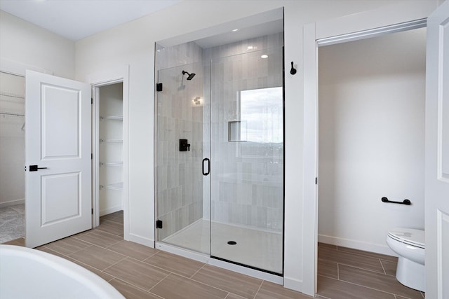 4706 W Lex Ave Lot 5, Spokane, WA 99208 - bathroom with a shower stall, a walk in closet, and a bath