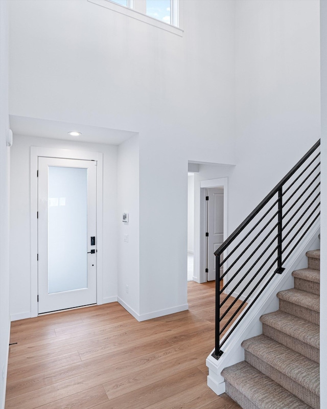 4706 W Lex Ave Lot 5, Spokane, WA 99208 - foyer featuring a towering ceiling, light wood-style flooring, and stairway