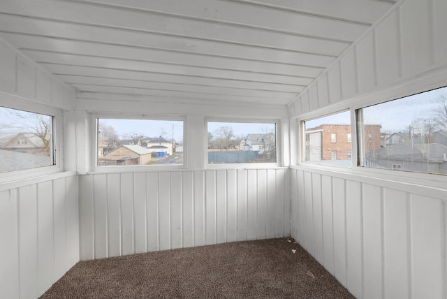 unfurnished sunroom with vaulted ceiling