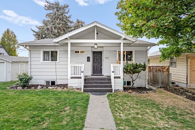 bungalow with a front lawn