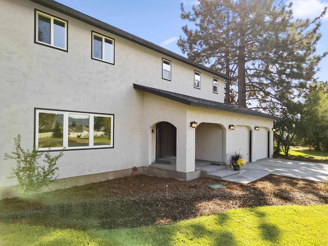 exterior space with a garage