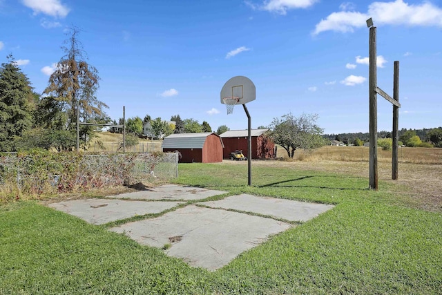 view of yard featuring basketball court