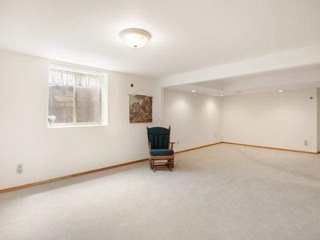 unfurnished room with carpet flooring