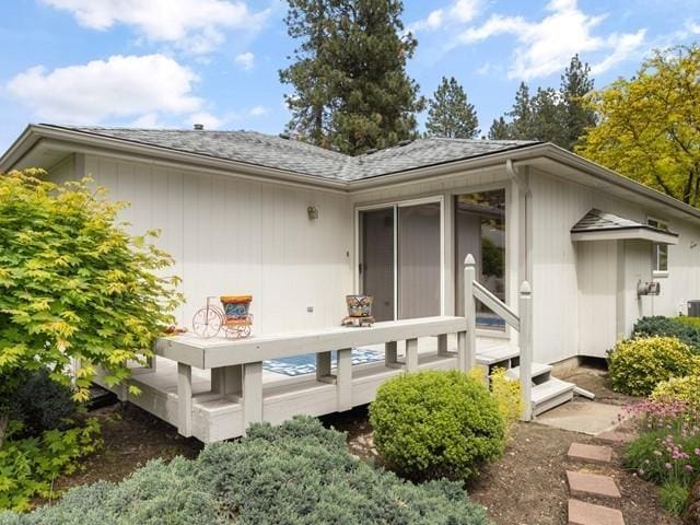 rear view of property with a deck