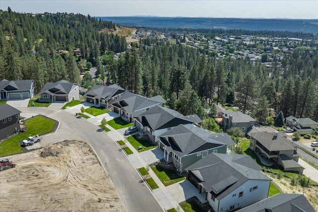 4233 W Tolliver Ct, Spokane, WA 99208 - aerial perspective of suburban area featuring a heavily wooded area