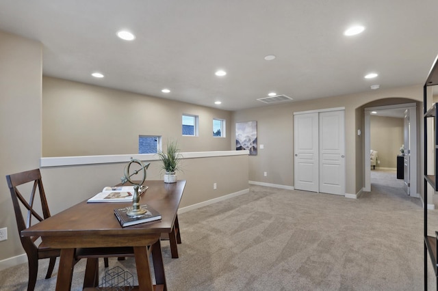 office area with light colored carpet