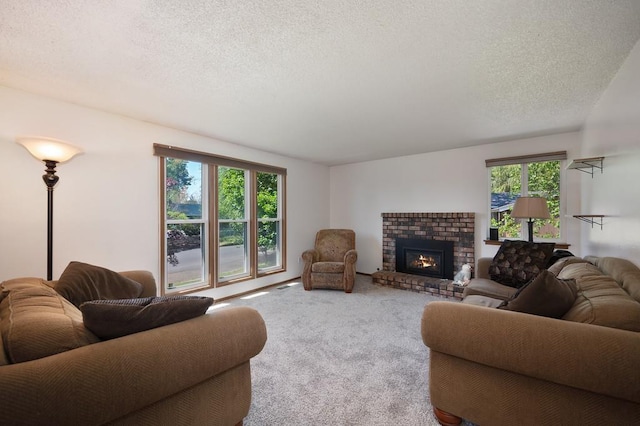 carpeted living room with a textured ceiling, a brick fireplace, and a healthy amount of sunlight