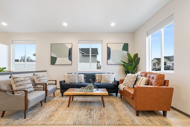 living room with light hardwood / wood-style flooring