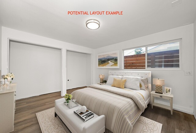 bedroom with two closets and dark hardwood / wood-style floors