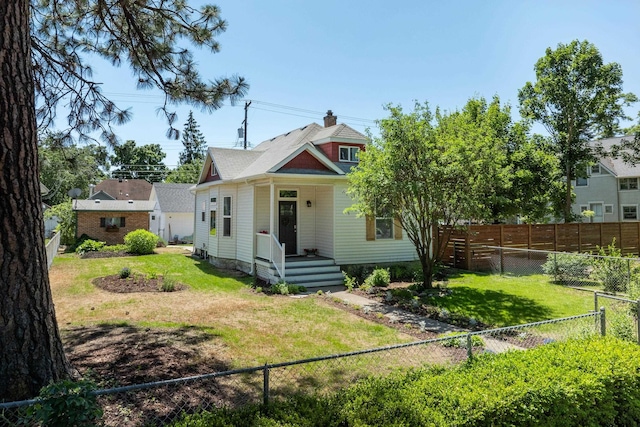 view of front of home with a front yard