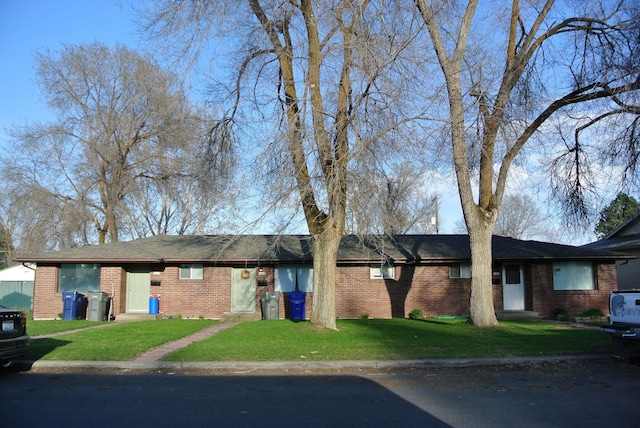 6408 N Normandie St, Spokane, WA 99208 - ranch-style house featuring a front yard