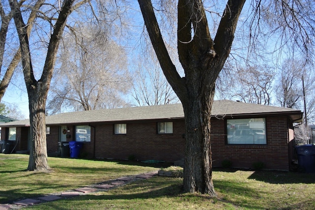 6408 N Normandie St, Spokane, WA 99208 - view of property exterior featuring a yard