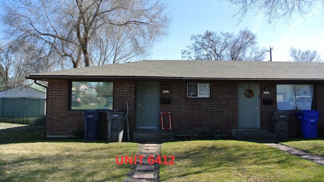 6408 N Normandie St, Spokane, WA 99208 - view of front of house featuring a front yard