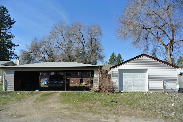 6408 N Normandie St, Spokane, WA 99208 - garage with a carport