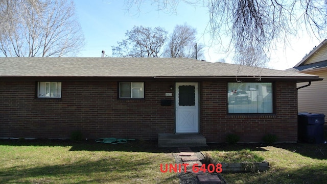6408 N Normandie St, Spokane, WA 99208 - view of front of house featuring a front yard