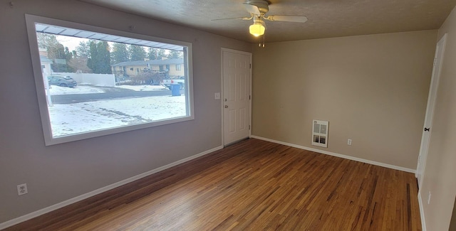 6408 N Normandie St, Spokane, WA 99208 - unfurnished room with ceiling fan, hardwood / wood-style floors, and a textured ceiling