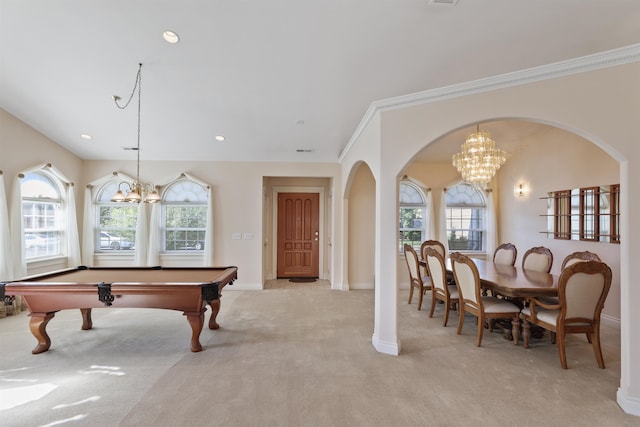 game room with a chandelier, ornamental molding, light colored carpet, and billiards