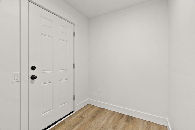 doorway with light hardwood / wood-style flooring