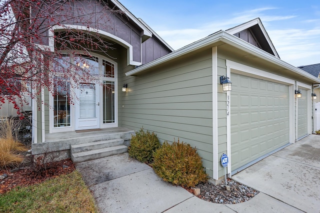 property entrance with a garage