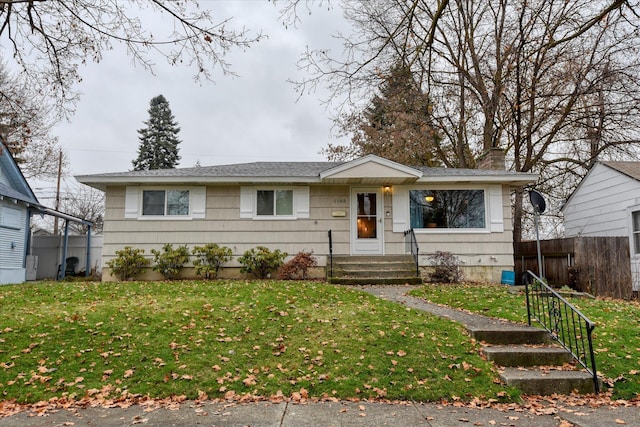 view of front of home with a front yard