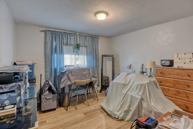 bedroom featuring light hardwood / wood-style floors