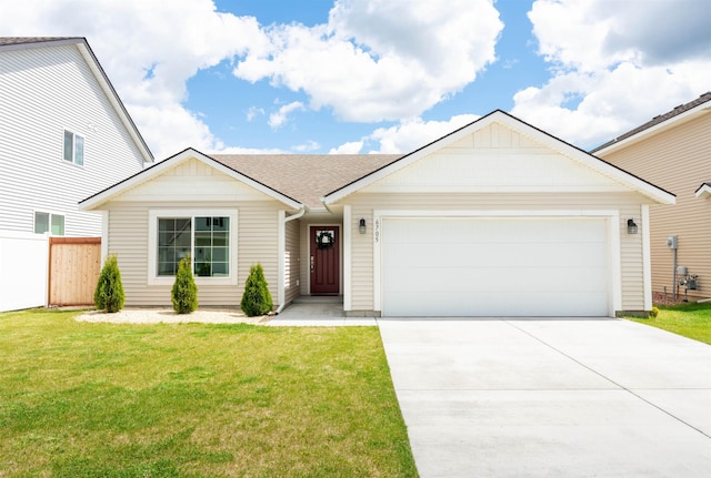 ranch-style house featuring a garage and a front lawn