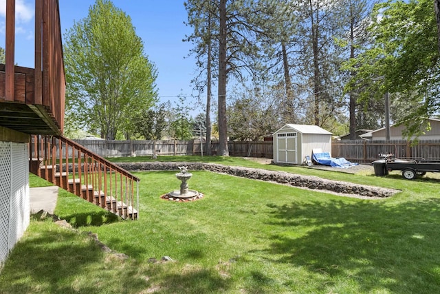 view of yard with a storage shed