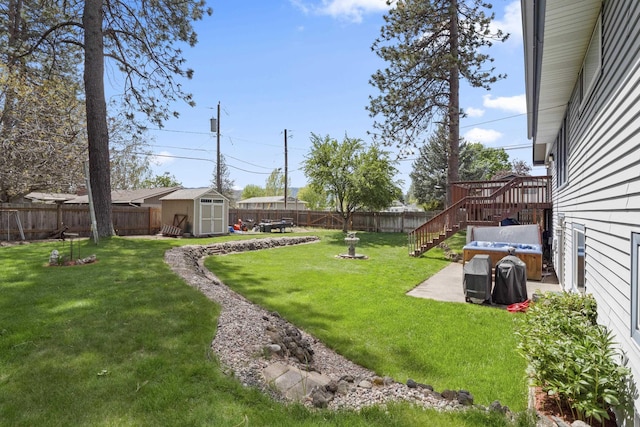 view of yard with a patio and a shed