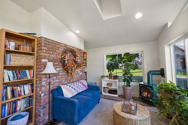 1323 E Deerhaven Ave Dalton Gardens, Dalton Gardens, Coeur D Alene, ID 83815 - living room with hardwood / wood-style floors, lofted ceiling, and a wood stove