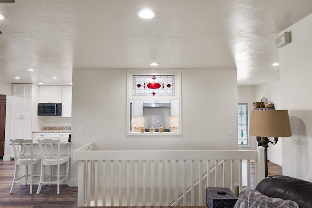 1323 E Deerhaven Ave Dalton Gardens, Dalton Gardens, Coeur D Alene, ID 83815 - interior space with wood-type flooring and a textured ceiling