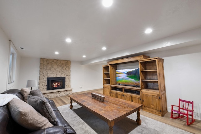 1323 E Deerhaven Ave Dalton Gardens, Dalton Gardens, Coeur D Alene, ID 83815 - living room featuring a fireplace and light hardwood / wood-style floors