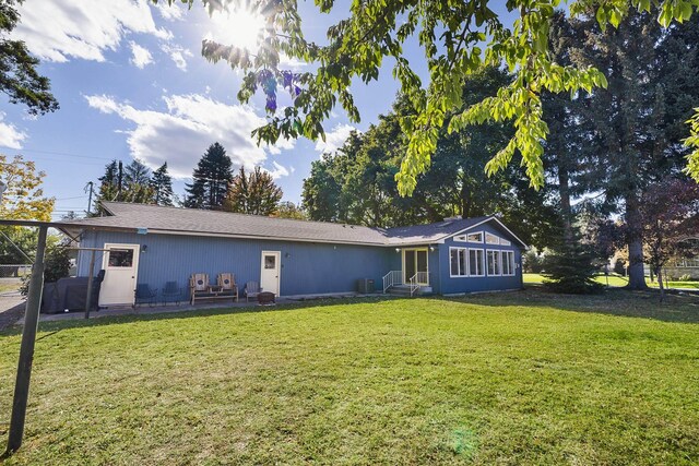 1323 E Deerhaven Ave Dalton Gardens, Dalton Gardens, Coeur D Alene, ID 83815 - rear view of property with a yard
