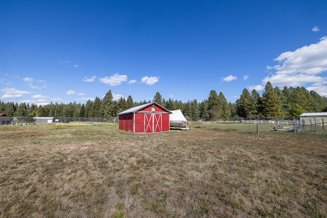 1323 E Deerhaven Ave Dalton Gardens, Dalton Gardens, Coeur D Alene, ID 83815 - view of yard featuring an outbuilding and a rural view