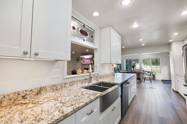 1323 E Deerhaven Ave Dalton Gardens, Dalton Gardens, Coeur D Alene, ID 83815 - kitchen featuring dishwasher, white cabinets, sink, dark hardwood / wood-style floors, and light stone countertops