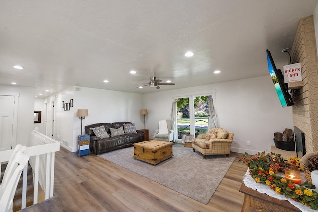 1323 E Deerhaven Ave Dalton Gardens, Dalton Gardens, Coeur D Alene, ID 83815 - living room featuring ceiling fan and hardwood / wood-style flooring