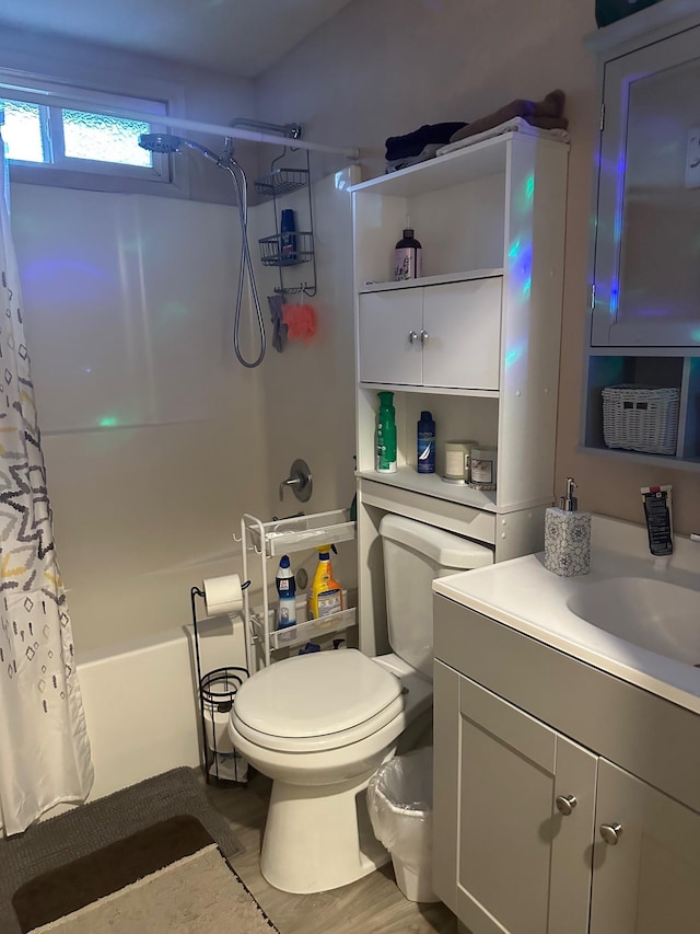 full bathroom featuring vanity, toilet, and shower / tub combo