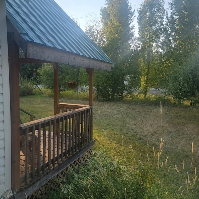 view of yard with a wooden deck