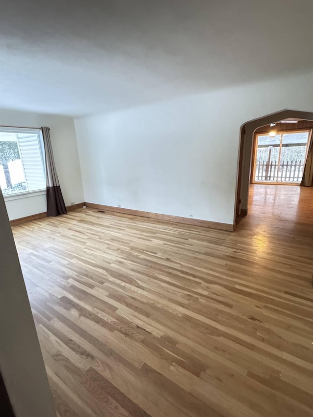 empty room featuring hardwood / wood-style flooring