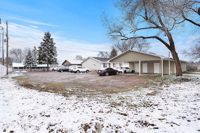 exterior space with a carport