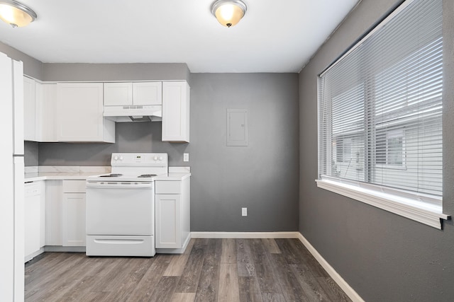 kitchen featuring electric range, white cabinets, and light wood-type flooring