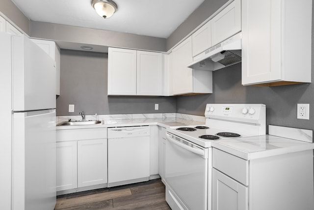 kitchen with white cabinets, white appliances, ventilation hood, and sink