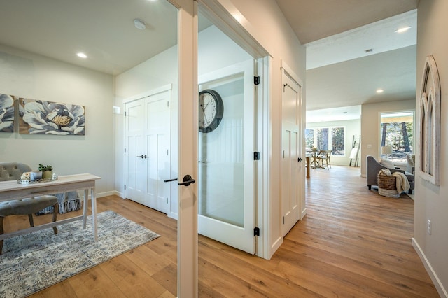 interior space featuring light hardwood / wood-style floors and french doors