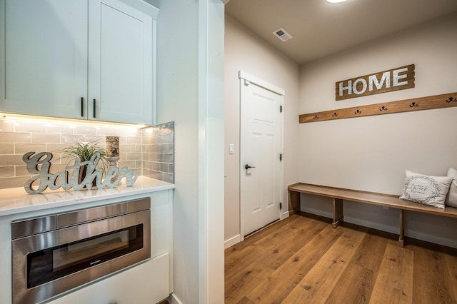 mudroom with light wood-type flooring