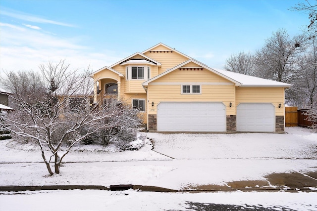 view of front of property featuring a garage