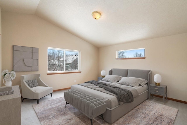 carpeted bedroom featuring vaulted ceiling