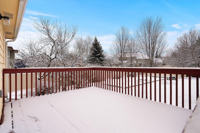 view of snow covered deck