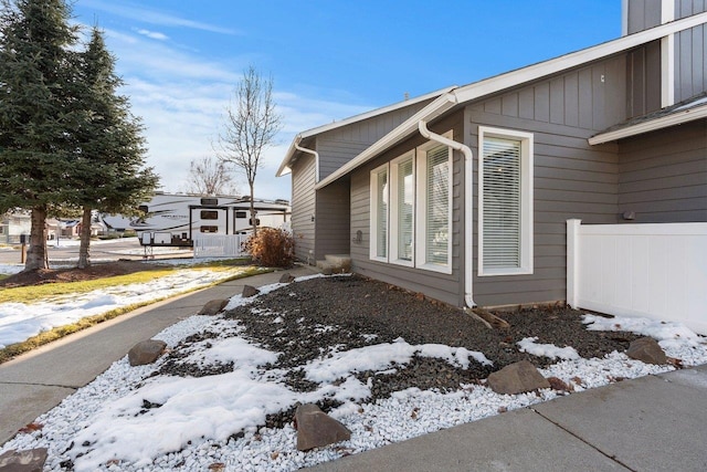 view of snow covered property