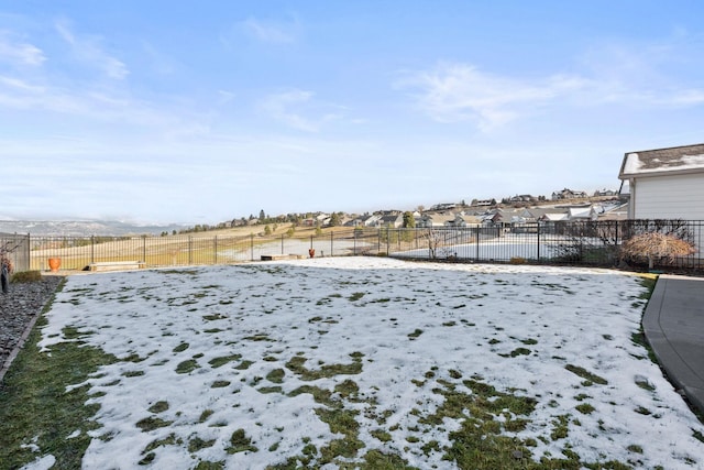 view of yard covered in snow