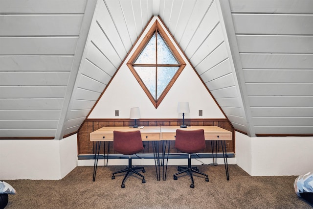 carpeted office with lofted ceiling