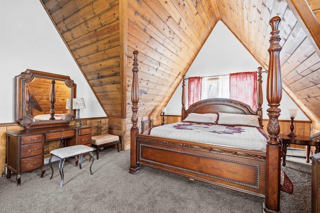 bedroom with carpet, a baseboard heating unit, wooden walls, and wooden ceiling